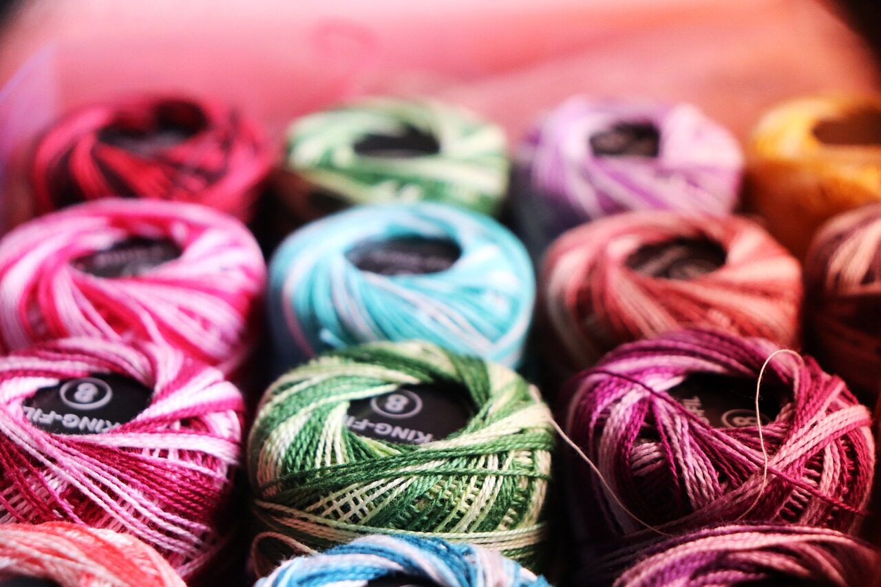 embroidery thread, colorful yarn, crochet, knitting, craft supplies, handmade, needlework, textile art, vibrant colors, yarn balls, sewing, embroidery, thread spools, hobby, diy crafts, home crafts, textile threads, fiber arts, colorful threads, yarn closeup, craft materials, wool, cotton thread, multicolor yarn, creative tools